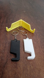 Multiple multicolor plastic keychain phone holders arranged together.