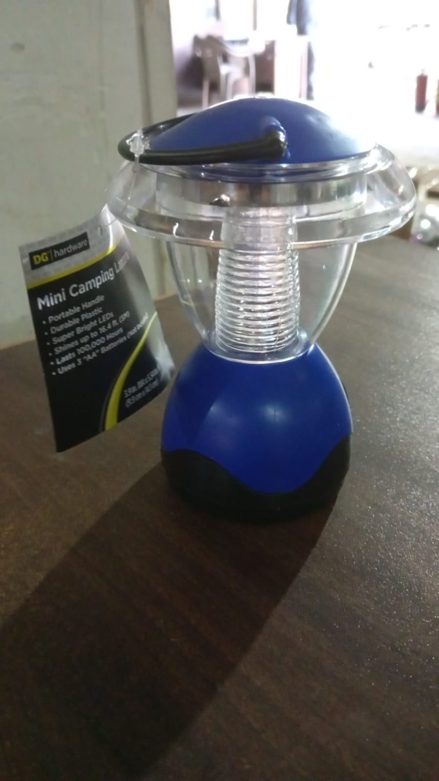 Open battery compartment of the portable LED camping lantern, ready for battery insertion.