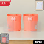 Two-piece set of wall-mounted toothbrush holders featuring butterfly design in original packaging