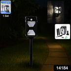 Outdoor solar powered LED lamp illuminating garden pathway at night