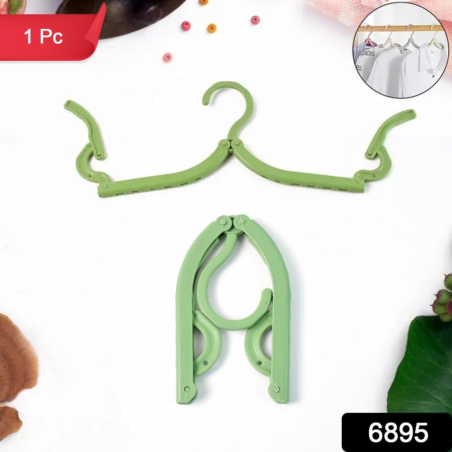 Compact foldable hanger securing garments firmly, perfect for travel and daily use