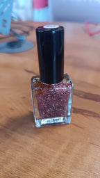 Compact 10 ML Metallic Rose Glitter Nail Paint bottle, ideal for travel