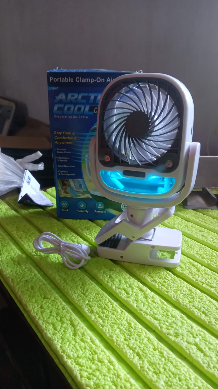 The versatile travel fan attached to a bicycle handlebar for on-the-go cooling.