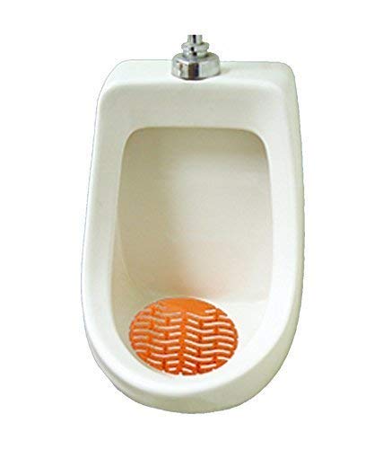 Round urinal screen mat preventing splashes in a public washroom.