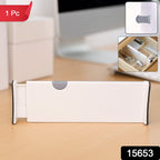 Adjustable drawer dividers used as desk drawer organizer for office supplies