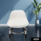 Person using the versatile rolling stool for a pedicure session in a salon setting.