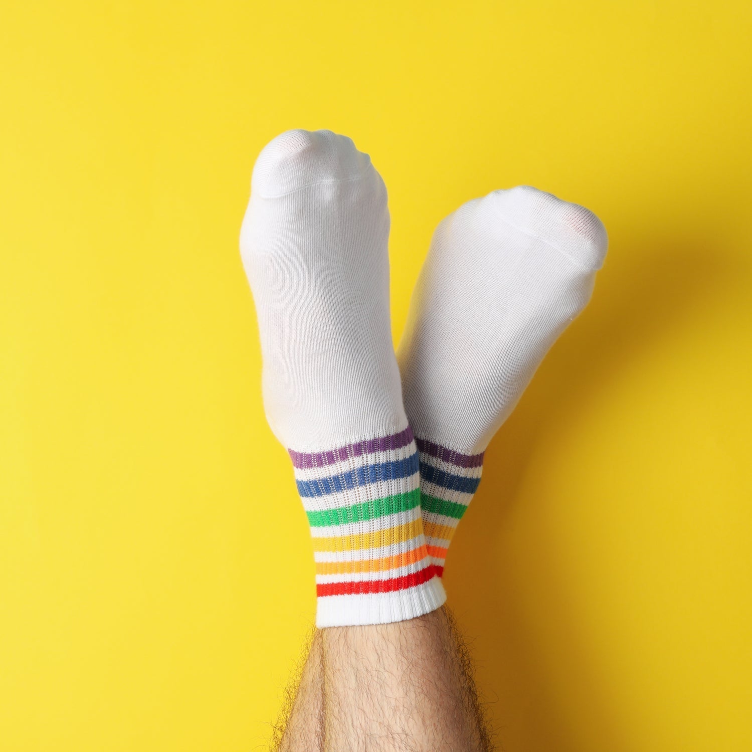 Set of men's multi-color cushioned ankle sports socks arranged together