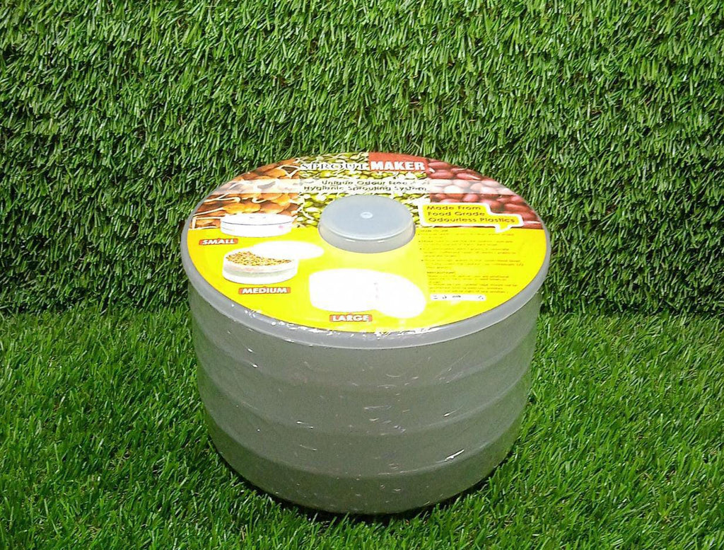 The complete Tidy Table white plastic sprout maker, demonstrating its compact and functional form.