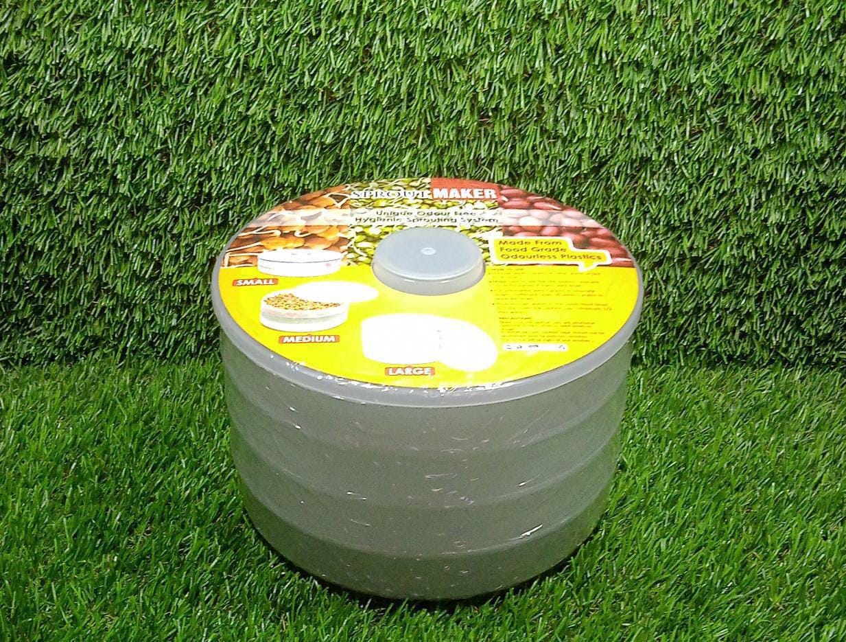 The complete Tidy Table white plastic sprout maker, demonstrating its compact and functional form.