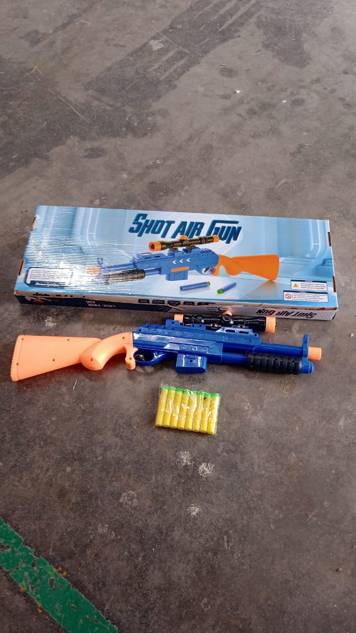 Shot air gun toy packaging box showing toy and foam bullets