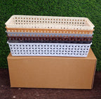 Bathroom vanity drawer with the multipurpose organizer trays holding toiletries.