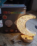 The Moon Crystal Lamp adding a modern and artistic touch to home decor.