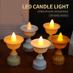 Set of 8 white water sensor LED diyas glowing warmly for festive decor.