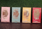 Assortment of elegant cash gift envelopes, perfect for various Indian festivals and events.