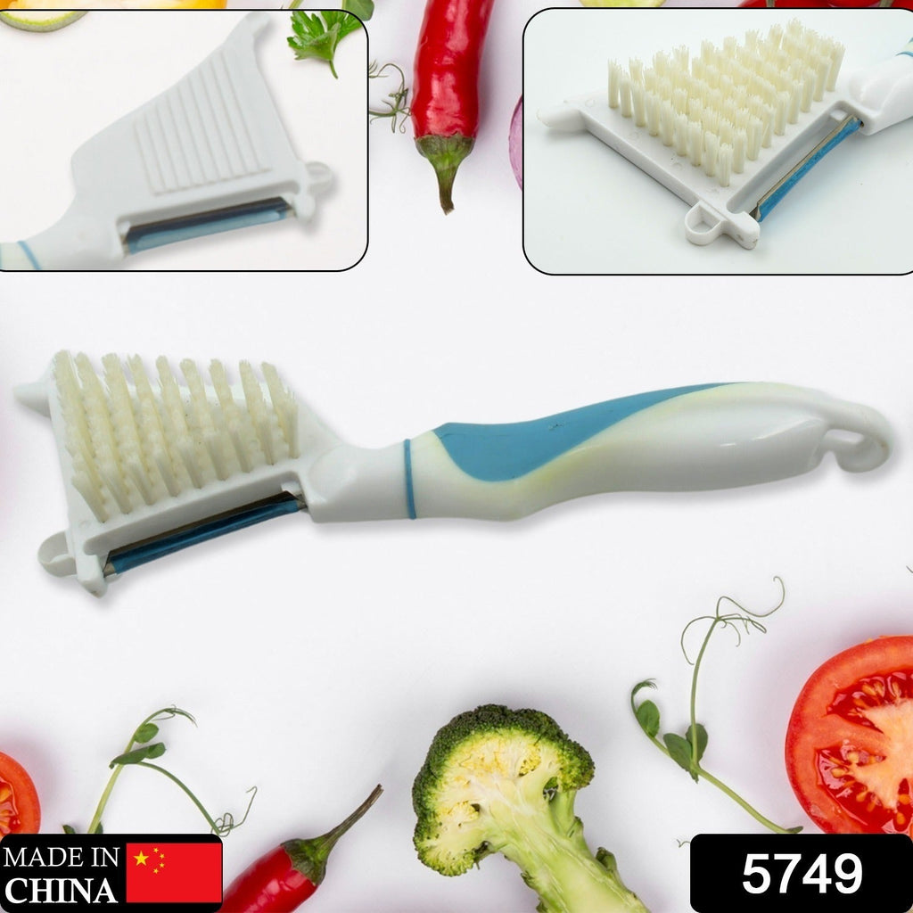 Close-up of the 5-in-1 peeler brush demonstrating its integrated cleaning bristles.