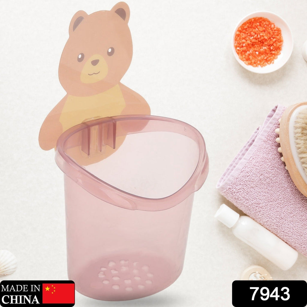 Teddy bear wall mount toothbrush holder organizes brushes and paste for children.