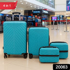 Side-by-side display of four different sized suitcases from the set