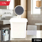 Sleek wall mounted toothbrush holder fixed on bathroom tile wall for organized space.