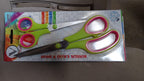 Detailed view of the rust-resistant stainless steel blades of the scissor set.