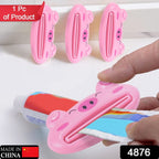 Portable multifunction laptop table with toothpaste squeezer for home or travel.
