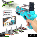 Children happily playing outdoors, launching a foam airplane with the toy gun.