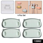 Close-up of pig-shaped cable holder clips organizing wires