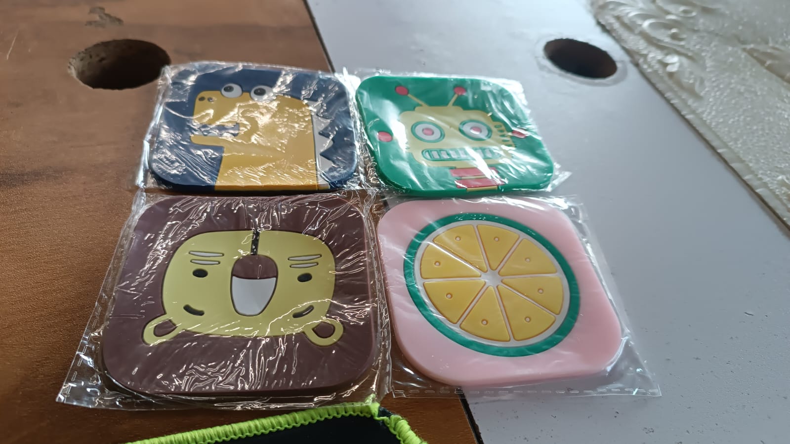 Isolated single silicone lemon drink coaster showing heat-resistant material