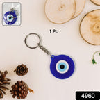 Close-up of Evil Eye silicone keychain in blue color with traditional design