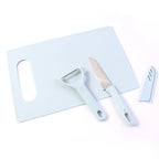 Vegetable peeler included in kitchen knife and chopping board set
