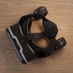 Controls for focus and volume on the Fitnos VR Headset.