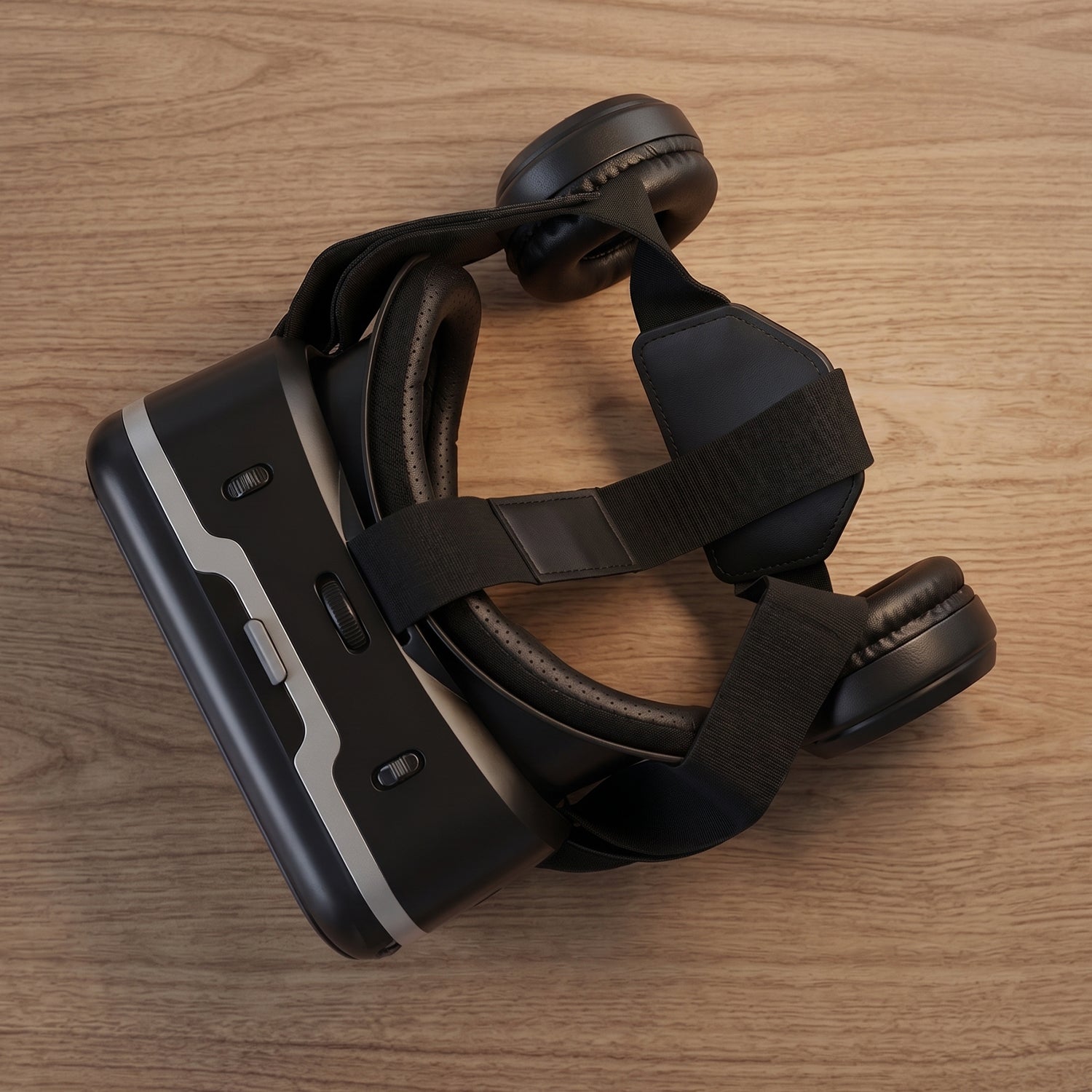 Controls for focus and volume on the Fitnos VR Headset.