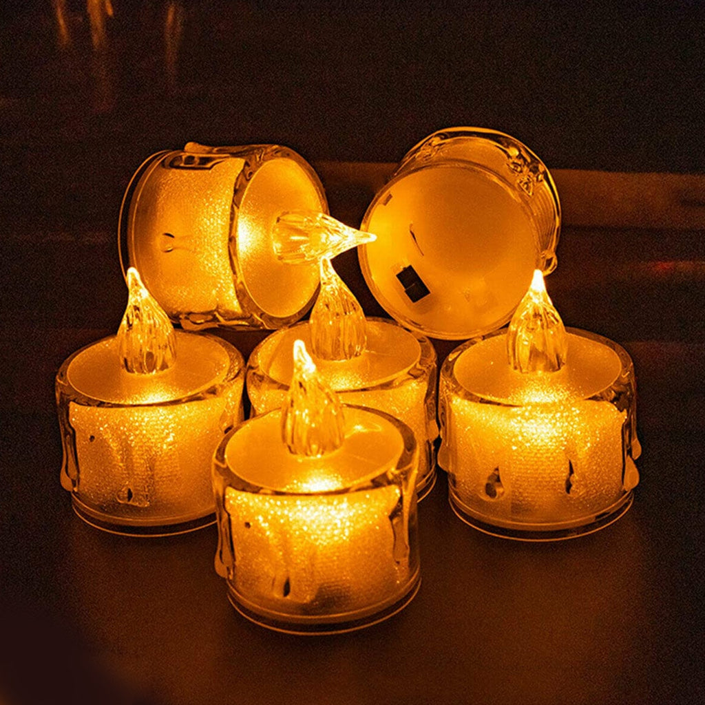 Flameless LED tea light candles arranged elegantly on a table, perfect for festive decor.
