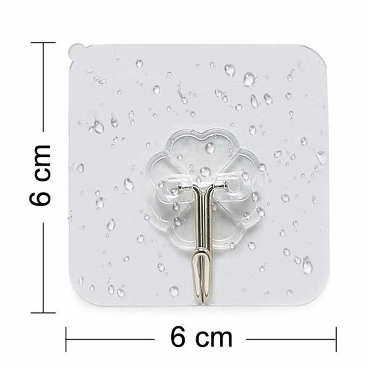 Individual small stainless steel adhesive hook with its protective backing visible before installation.