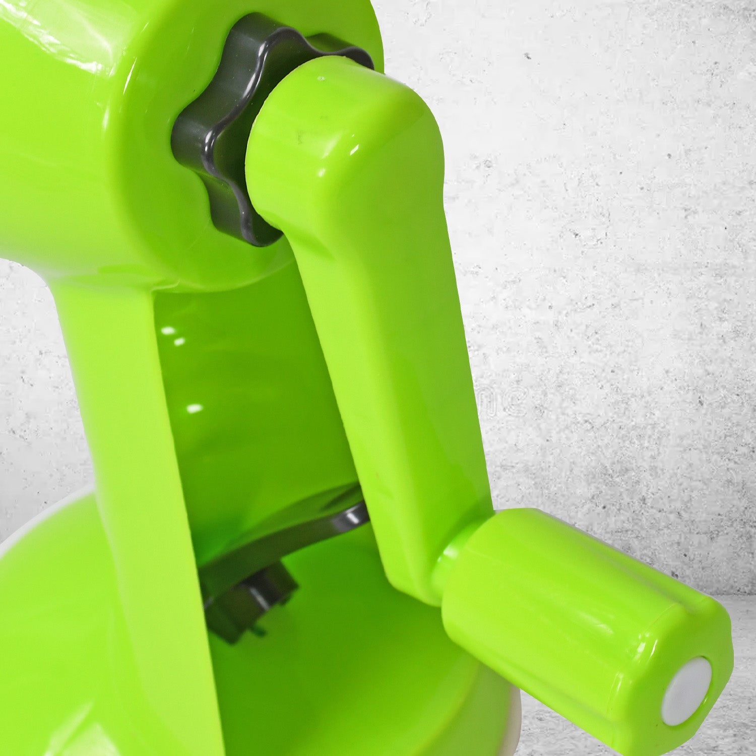 Multi-functional vegetable grater with a rotary handle for easy use.