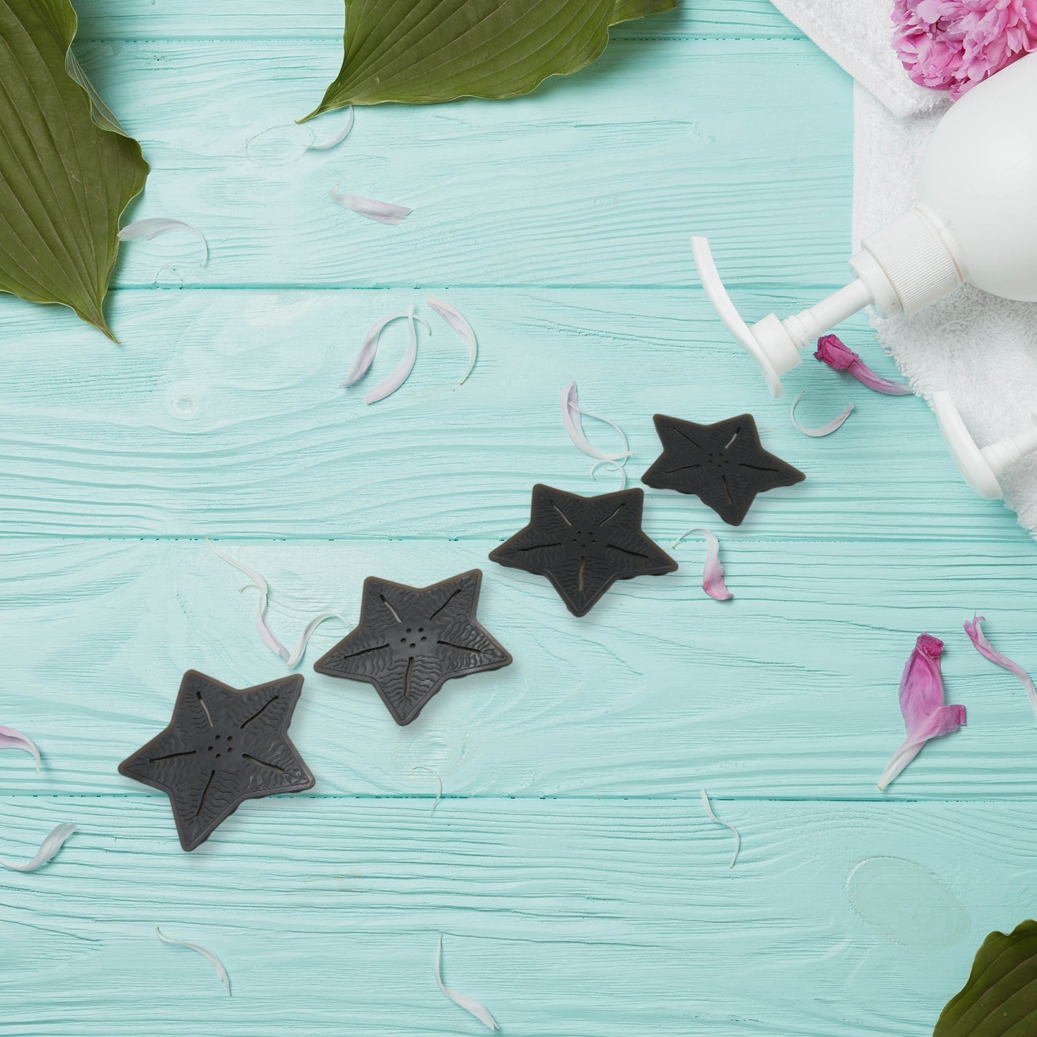 Kids anti-slip bath mats securely placed in a bathtub for child safety.