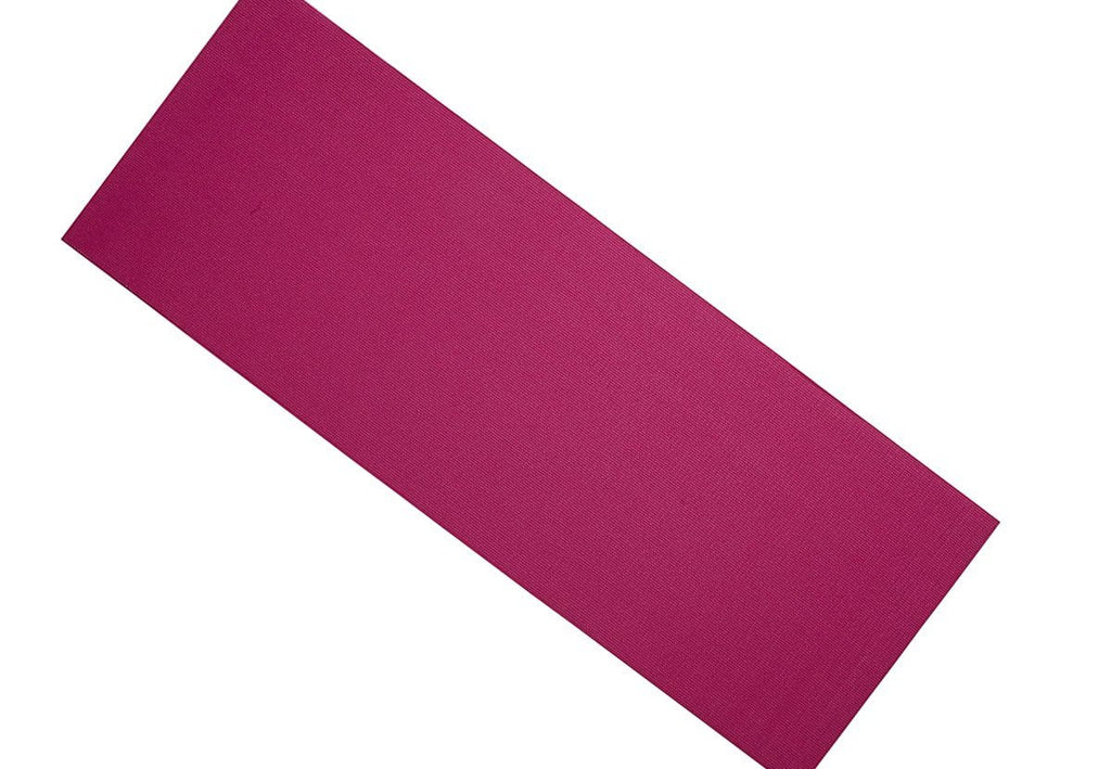 Eco-Friendly Yoga Mat in a studio setting, highlighting its texture.