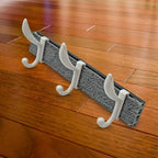 Side view of the GlimmerHome wall mounted coat hanger rack with items hanging