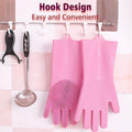 Multicolor silicone cleaning gloves with scrubbing bristles displayed.