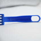 Three distinct cleaning brushes for diverse kitchen tasks.