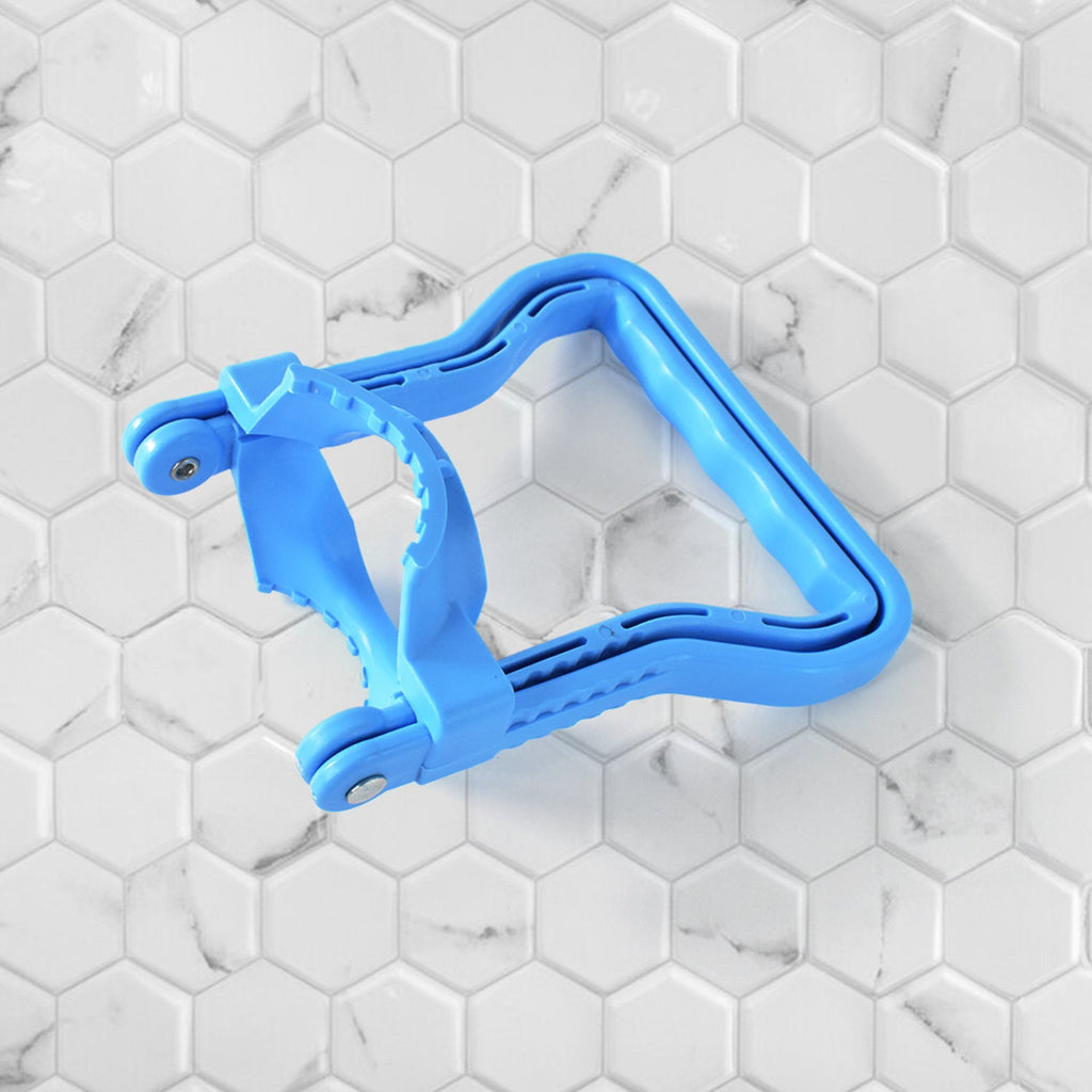 Hydro Hold plastic water bottle lifter handle in use on water container