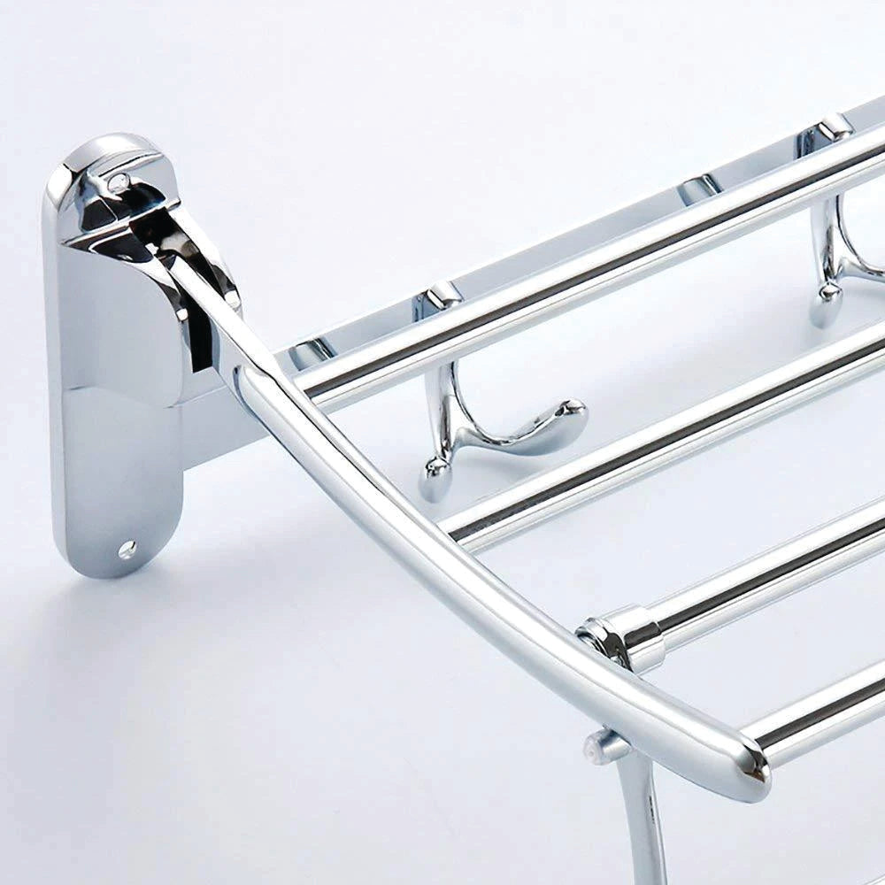 Space-saving folding towel rack in its collapsed position, ideal for small bathrooms.