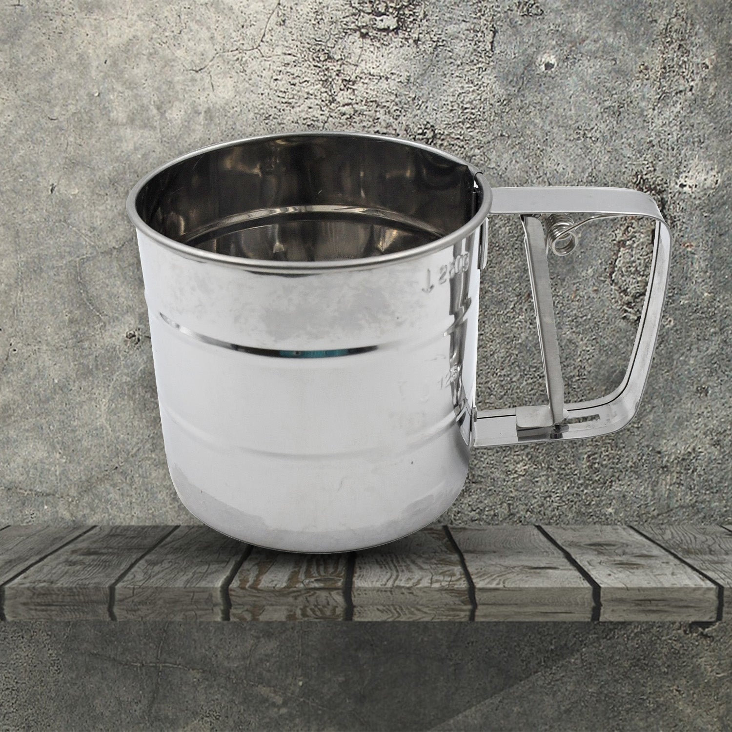Flour sifter in action, demonstrating how it easily sifts ingredients for baking.