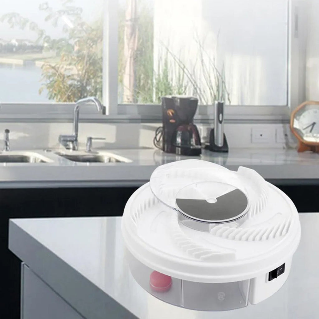 Portable electric fly trap shown from a side angle, highlighting its discreet profile.
