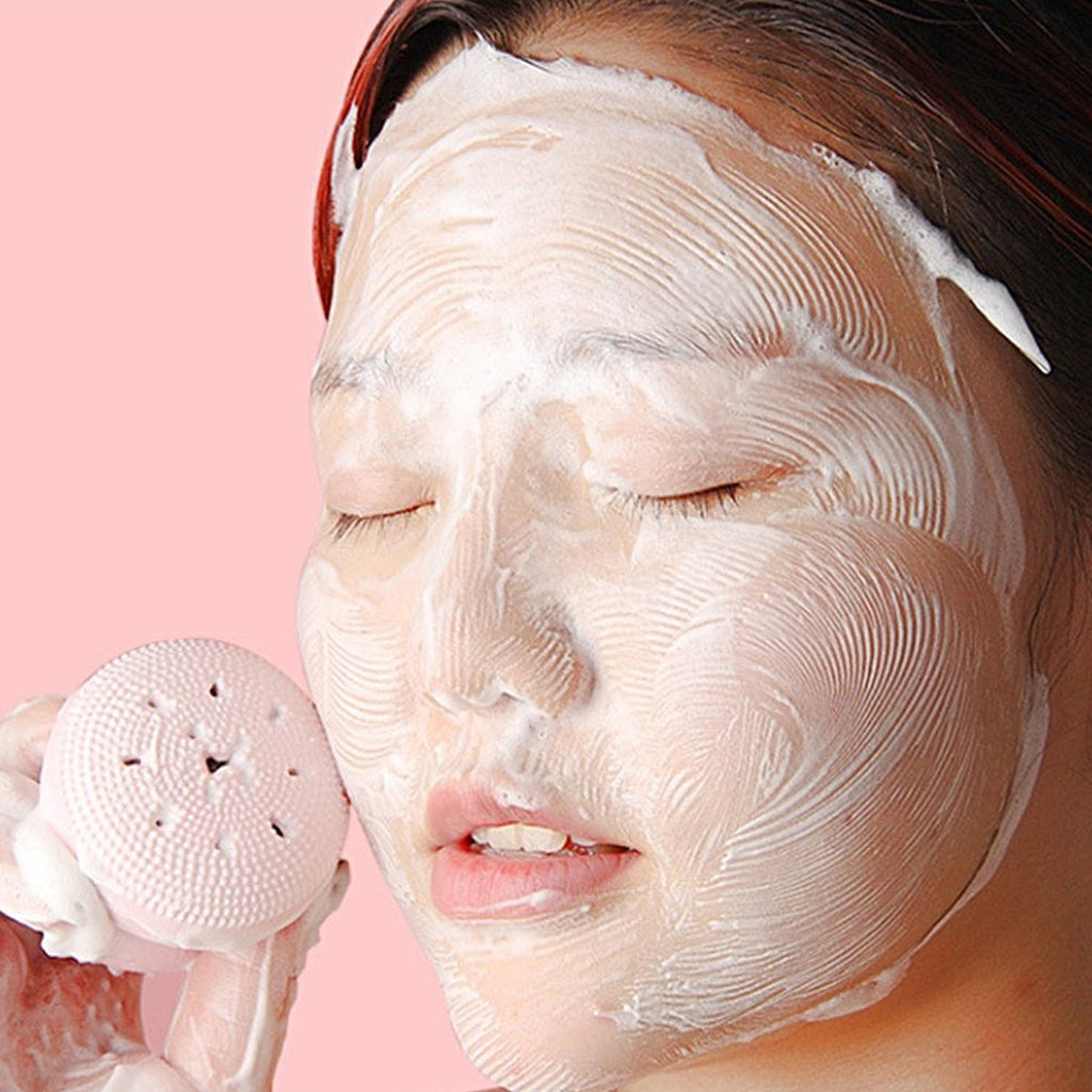 Soft bristles of the silicone facial cleansing brush providing gentle exfoliation.