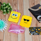 Vibrant emoji hot water bag, designed for effective relief from aches and pains.