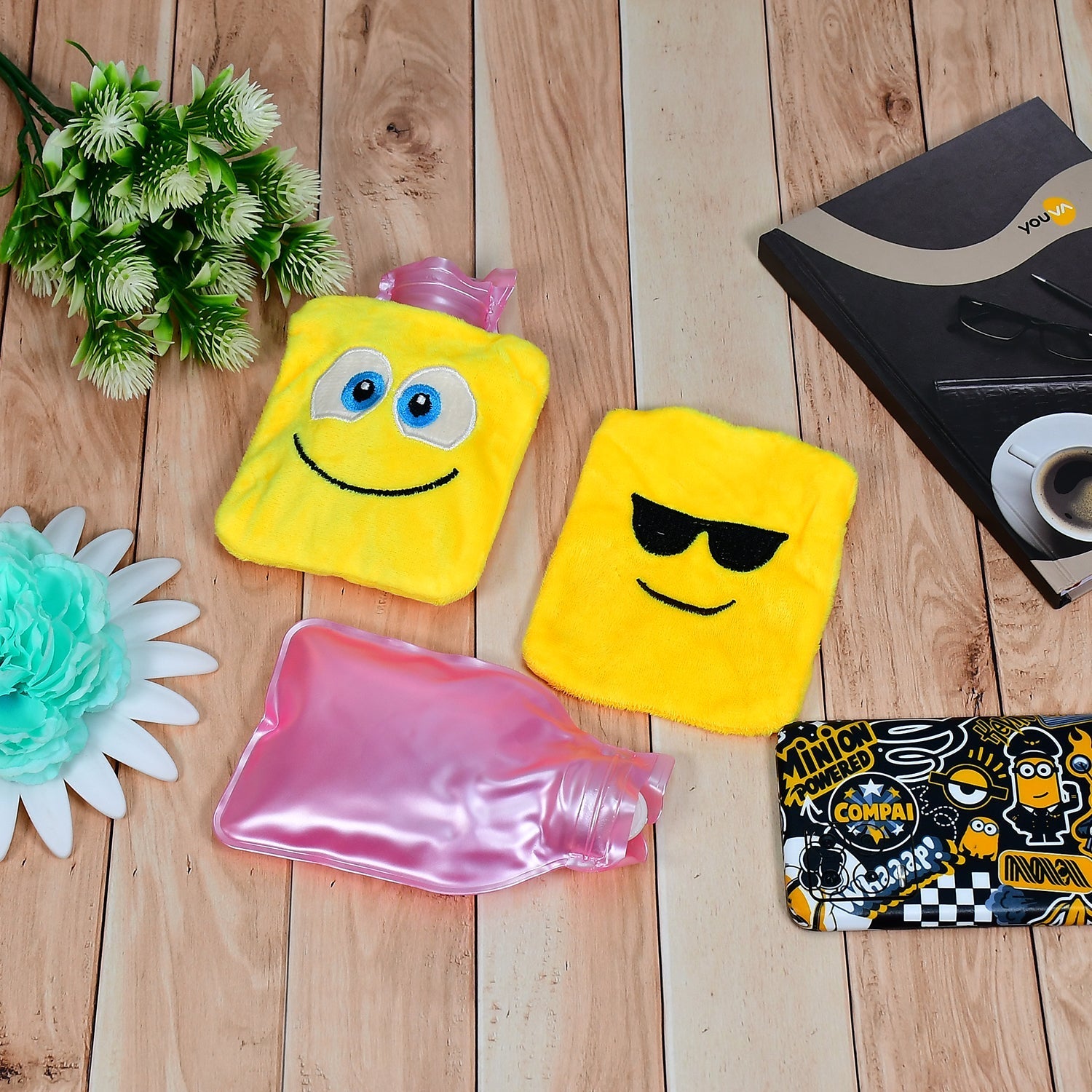 Vibrant emoji hot water bag, designed for effective relief from aches and pains.