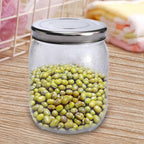 Two Plastic Mason Jars, ready for organizing your kitchen with their versatile use.