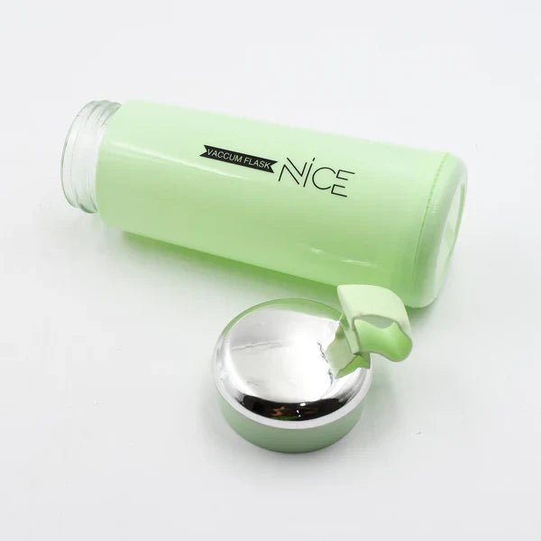 Lifestyle image showing leakproof 400ml glass water bottle in light green