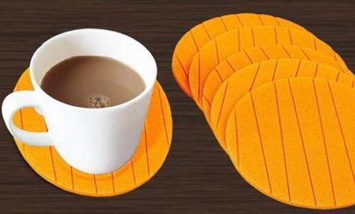 Various round shape silicone cup mats in different colours, showcasing versatility.