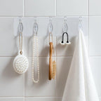 A pack of five transparent adhesive wall hooks from GlimmerHome, ready for damage-free hanging.
